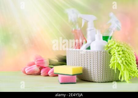 https://l450v.alamy.com/450v/2e4y5ja/spring-cleaning-concept-cleaning-supplies-and-flowers-on-blur-background-2e4y5ja.jpg