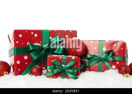 Gift boxes, baubles and snowflakes isolated on white, a cut out festive set for winter holiday cards and sale banners Stock Photo