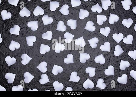 black background with white hearts on Valentine's Day Stock Photo