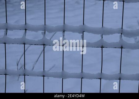 snow covered fence Stock Photo