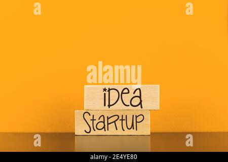 Startup idea conceptual image for businessman, wooden pegs background photo Stock Photo