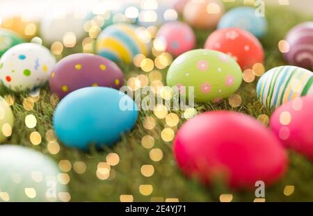 colored easter eggs on artificial grass Stock Photo