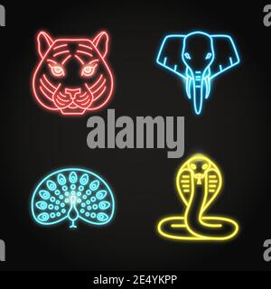 India icons set in glowing neon style. Sacred animals symbols including tiger, cobra snake, elephant and peacock. Vector illustration. Stock Vector