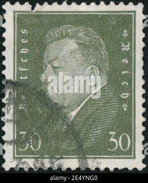 POLTAVA, UKRAINE - January 25, 2021. Vintage stamp printed in Germany circa 1928 show Friedrich Ebert Stock Photo