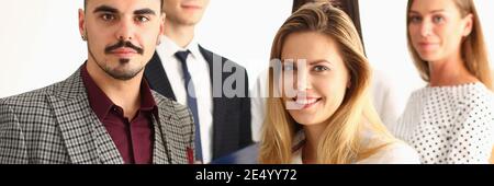 Successful happy workers are posing at camera Stock Photo
