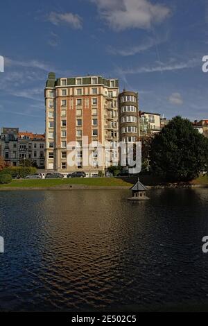 Buildings in eclectic art nouveau style on the embankment of Ixelles lakes, Brussels, Belgium Stock Photo
