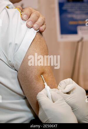 Having a medical injection Stock Photo