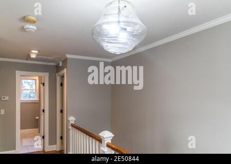 Empty second floor landing to stairs and guest bedrooms Stock Photo