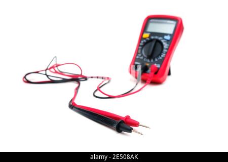 Red digital multimeter with probes on white background - Multimeter is an electronic measuring instrument for voltage, amper, resistance Stock Photo