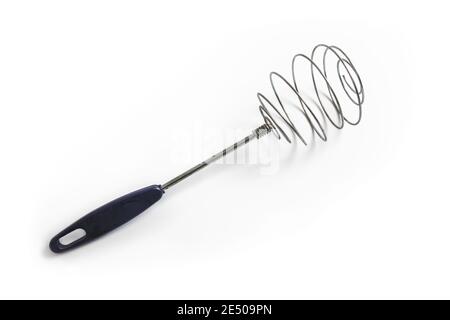 Old spiral whisk for whipping on white background Stock Photo