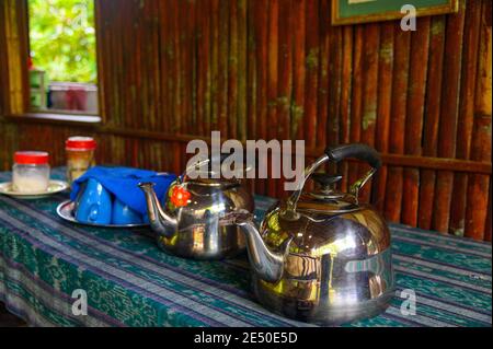 tea pots and cups ready for guests at the Nanga Sumpa Lodge Stock Photo