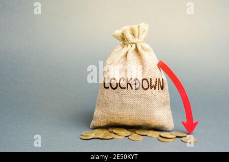 Money bag Lockdown and down arrow. Coronavirus pandemic infection. Financial and economic crisis concept. Global recession. Market crash, collapse. CO Stock Photo