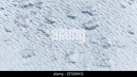 Raindrops on the metal surface Stock Photo