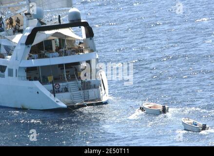 'Pirates stand on an upper deck of the luxury yacht ''Ponant'' after it was seized off the Somali coast April 4, 2008. The yacht was sailing to the Mediterranean Sea from the Seychelles when it was seized in the Gulf of Aden. The pirates took hostage its 30 crew members, many of them French nationals, prompting Paris to send naval forces to the area. Photo by HCMS Charlottetown - TF 150/French Defence Ministry/ABACAPRESS.COM' Stock Photo