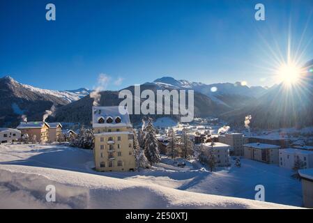 Beautiful sunrise after heavy snowfall in the Swiss Mountains Alps at Davos Stock Photo