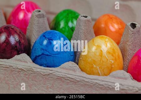 Colored chicken eggs in the package Stock Photo