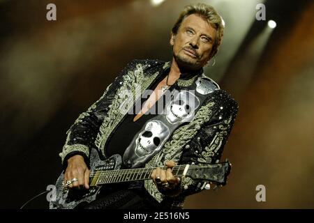 File photo : French singer Johnny Hallyday performs live on stage during  'Les Vieilles Charrues' festival, in