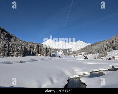 cross country slope at dischma valley of davos after impressive snowfall Stock Photo