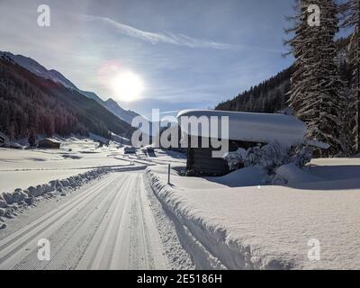 cross country slope at dischma valley of davos after impressive snowfall Stock Photo