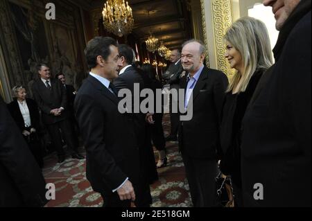 French President Nicolas Sarkozy receives French director Claude Berri and Nathalie Rheims before the projection of the famous film 'Bienvenue chez les Ch'tis' by Dany Boon at Elysee Palace in Paris, France, on April 15, 2008. Photo by Elodie Gregoire/ABACAPRESS.COM Stock Photo