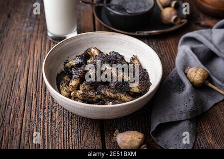 Classic Slovakian food called Sulance, sweet potato dumplings with poppy seeds in a bowl Stock Photo