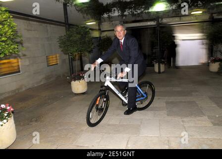 US President George W. Bush rides an Israeli-made bicycle presented to him by Israeli Prime Minister Ehud Olmert during a private dinner at his residence in Jerusalem, Israel on May 15, 2008. Bush was on a 3-day visit to Israel to mark and celebrate the 60th anniversary of the country's foundation. Photo by Balkis Press/ABACAPRESS.COM Stock Photo