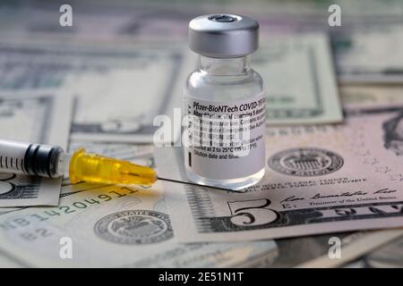 Genuine Pfizer BioNTech COVID-19 Vaccine vial. Real vaccine photo. Selective focus. Stafford, United Kingdom - January 23 2021. Stock Photo