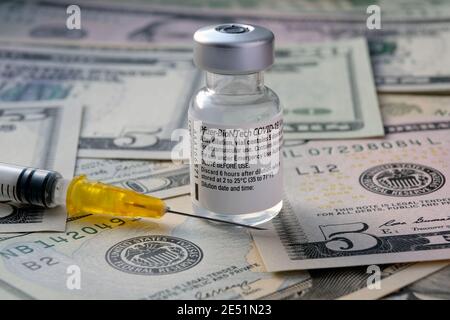 Genuine Pfizer BioNTech COVID-19 Vaccine vial. Real vaccine photo. Selective focus. Stafford, United Kingdom - January 23 2021. Stock Photo