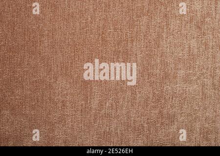 The texture of coarse brown fabric. Is used for upholstery of rustic furniture. Stock Photo