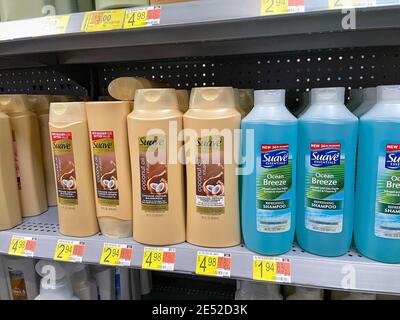 Orlando,FL USA - January25, 2021: Suave brand shampoo and conditioner  bottles on a shelf at Walmart. Stock Photo