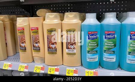 Orlando,FL USA - January25, 2021: Suave brand shampoo and conditioner  bottles on a shelf at Walmart. Stock Photo