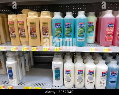 Orlando,FL USA - January25, 2021:  Suave brand shampoo and conditioner  bottles on a shelf at Walmart. Stock Photo