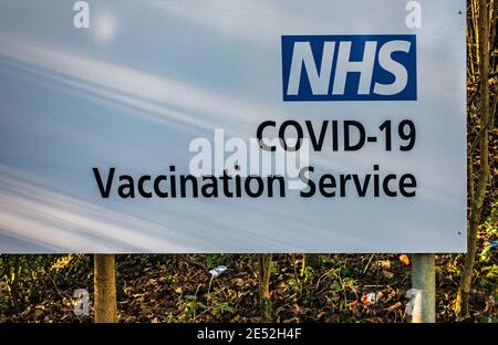 Covid 19 new sign for Covid 19 Vaccination Service Centre Stock Photo