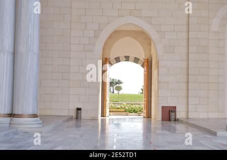 A view from inner yard of Grand  Camlica mosque  (Turkish: Çamlıca Camii). Courtyard door opens to outer zone. Stock Photo