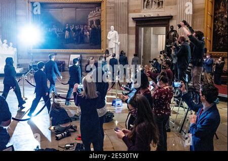 Washington, United States. 25th Jan, 2021. The procession through the Capitol Rotunda of the House impeachment managers bringing the articles of impeachment from the House to the Senate. Credit: SOPA Images Limited/Alamy Live News Stock Photo
