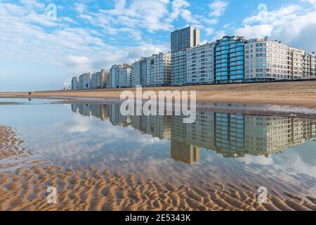 Oostende (Ostend) cityscape reflection by its North Sea beach, Belgium. Stock Photo