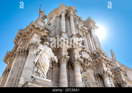 The marble facade of the Cathedral of Syracuse shot from below in a sunny summer day Stock Photo