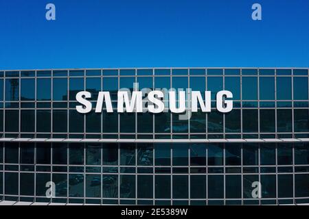 Large Samsung logo sign on a company building in Herzliya Hi Tech campus, Aerial image. Stock Photo