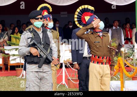 Nagaon, Assam, India - 26 Jan 2021: The security personal salutes the Indian National flag during the obserbvation of  Republic Day in Nagaon, Assam, India.     Credit: DIGANTA TALUKDAR/Alamy Live News Stock Photo