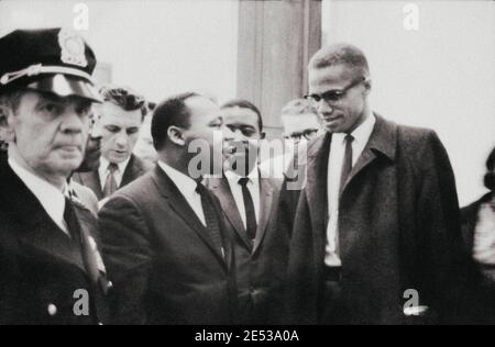 Archival photo of Martin Luther King and Malcolm X waiting for press conference. USA. March 26, 1964 Stock Photo