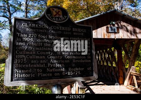 Bethel, Alabama/USA-Nov. 10, 2018: Historic marker for the Clarkson-Legg Covered Bridge in Cullman County with the bridge in the background. Stock Photo