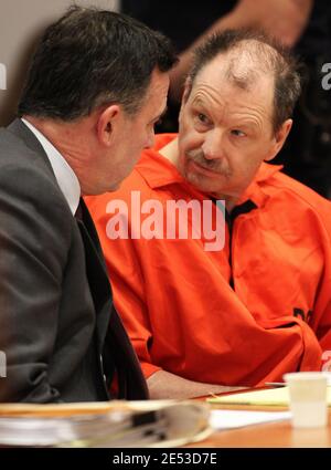 Kent, Washington, USA. 18th Feb, 2011. GARY RIDGWAY, whose turned 62 today, the infamous Green River serial killer (right), speaks to his defense attorney MARK PROTHERO before pleading guilty to aggravated first-degree murder in the death of Rebecca 'Becky' Marrero in court proceedings at the Maleng Regional Justice Center in Kent. Ridgway was sentenced to an additional life sentence as part of his 2003 plea deal. Ridgway was convicted in 2003 of the murders of 48 other women. Becky was last seen on December 3, 1982 and is the 49th confirmed victim of the Green River Killer. Marrero's sku Stock Photo