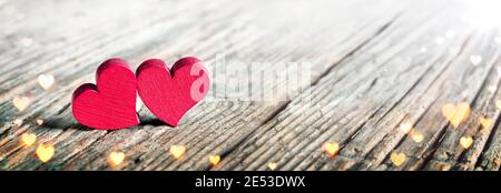 Hearts On Wooden Background - Symbol Of Love Stock Photo