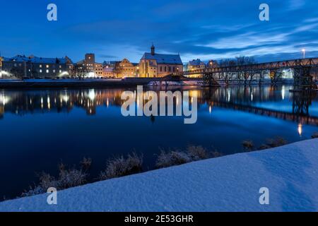 Old town of Regensburg on the danube river in winter with fresh snow