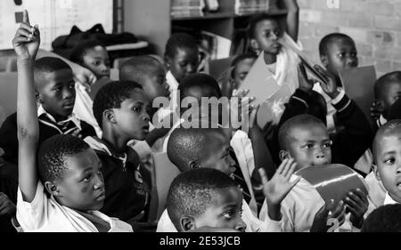 JOHANNESBURG, SOUTH AFRICA - Jan 05, 2021: Soweto, South Africa - October 26 2011: African Children in Primary School Classroom Stock Photo