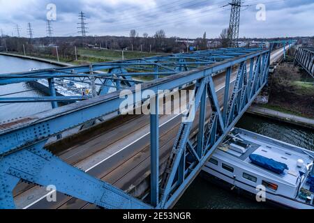 The Rhine-Herne Canal in Oberhausen, bus and tram bridge, canal ship, freighter, NRW, Germany, Stock Photo