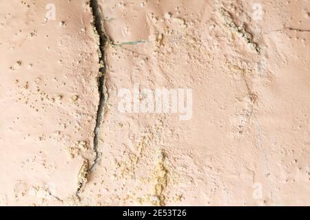 Abstract grunge textured wall with space  - cracked peeling paint wall background Stock Photo