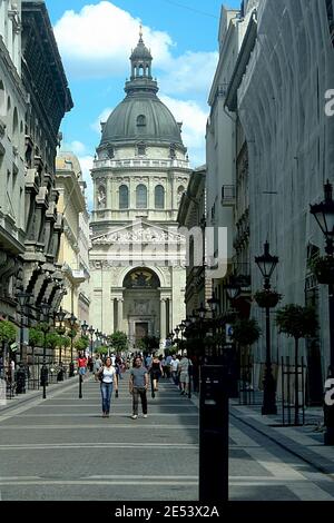 BUDAPEST, HUNGARY - JUNE 14, 2008: Pedestrians walking in crowd in front of Szent Istvan Basilica, aka Saint Stephen Church. This Basilica is one of t Stock Photo