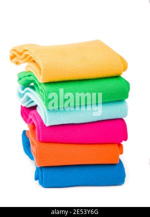 colored socks stacked on a white background Stock Photo