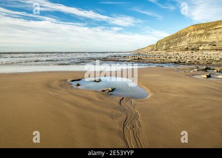 Dunraven Bay in the Vale of Glamorgan south Wales on a sunny and cold January day. The beach lies on the Glamorgan Heritage Coast.